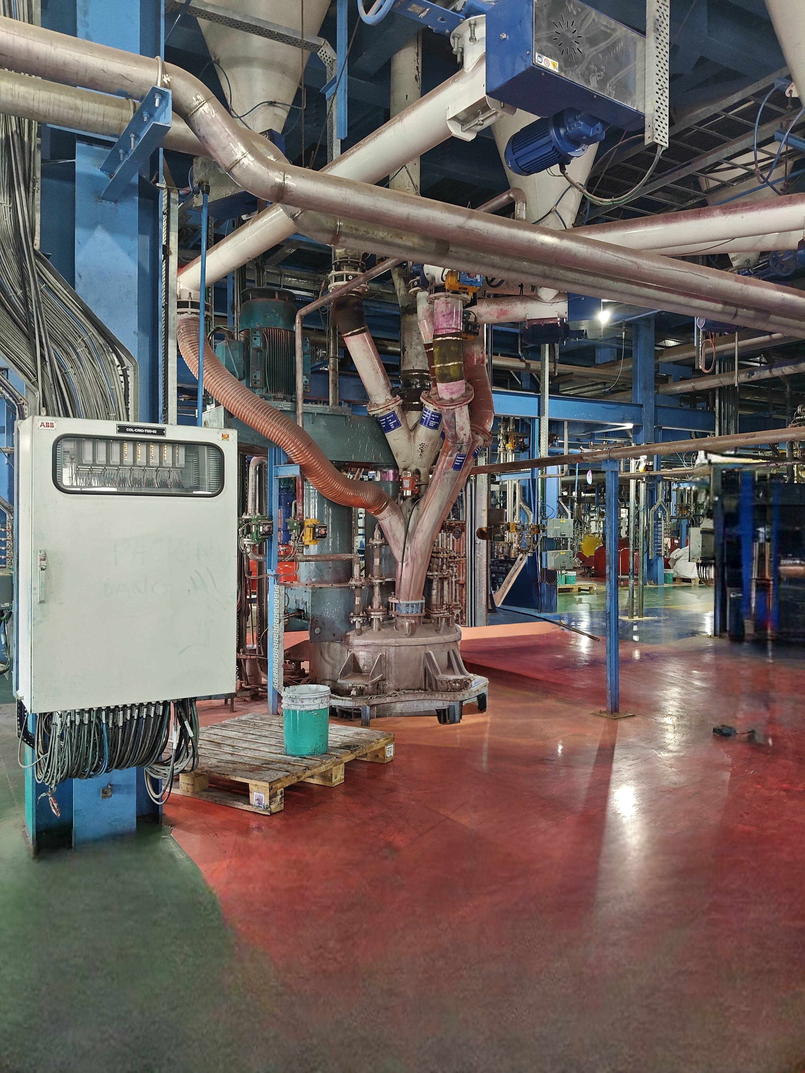 Engineering professional working with industrial equipment